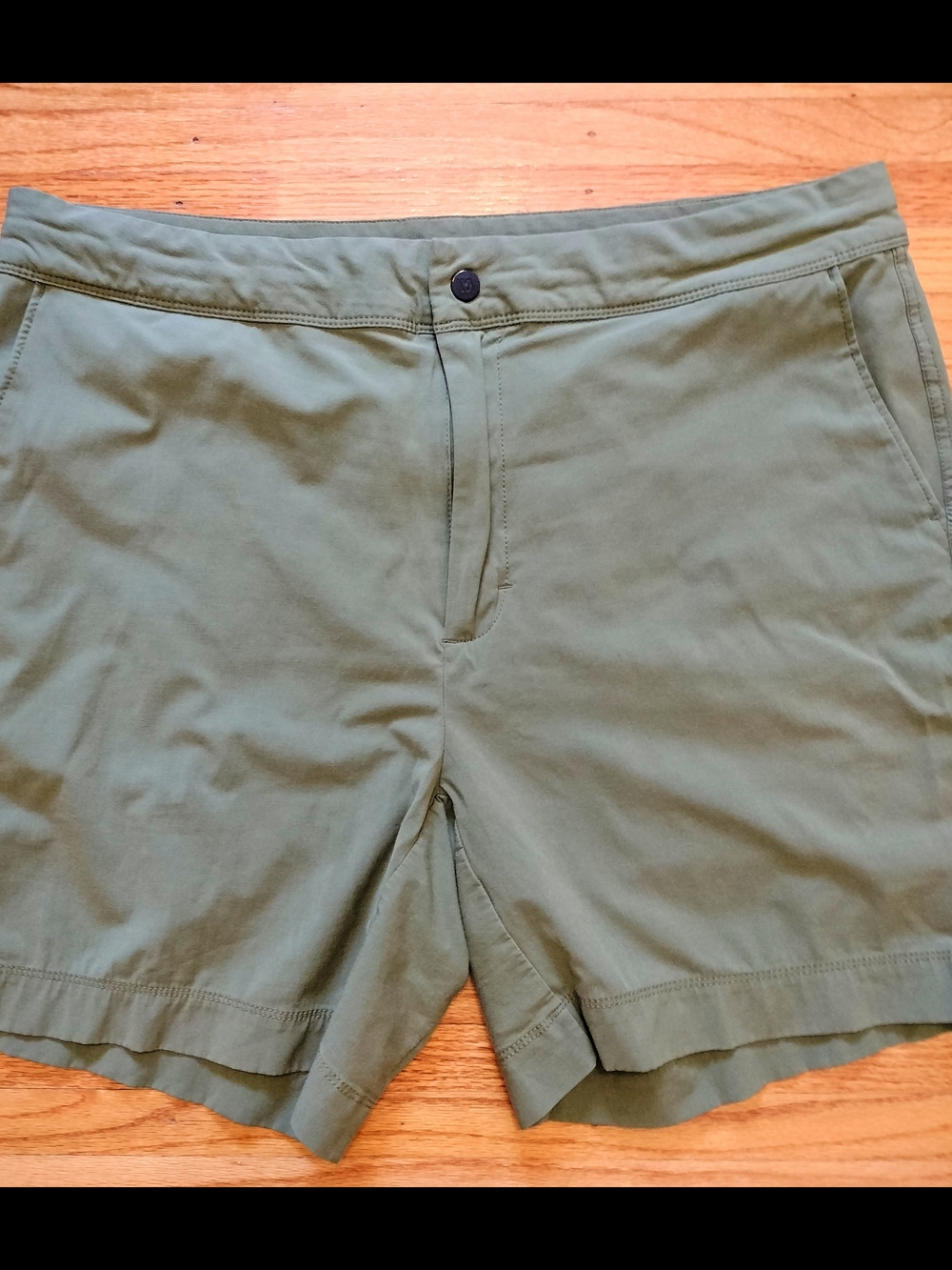 VRST Men's 7" Elevate Unlined Shorts in Olive Green. Size 36